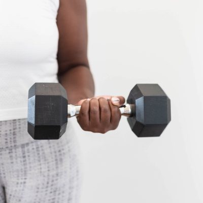 Digital Well-Being | Woman holding dumbbell